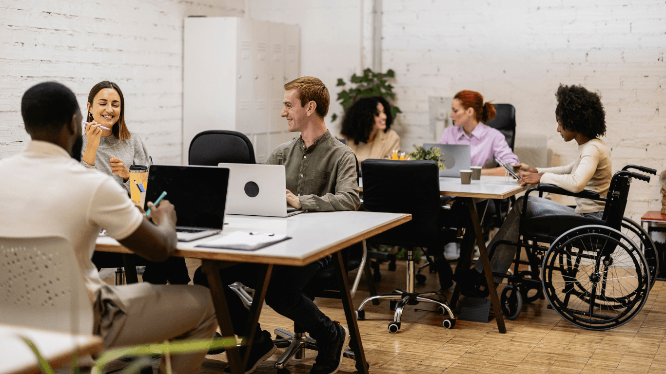 A diverse team collaborating on AI adoption